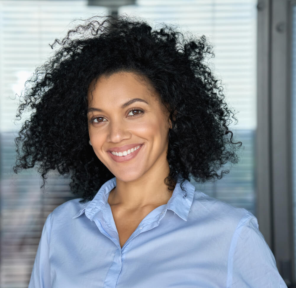 a woman smiling for the camera