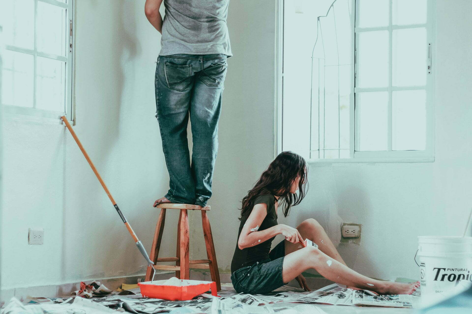 a man and a woman kneeling on the floor