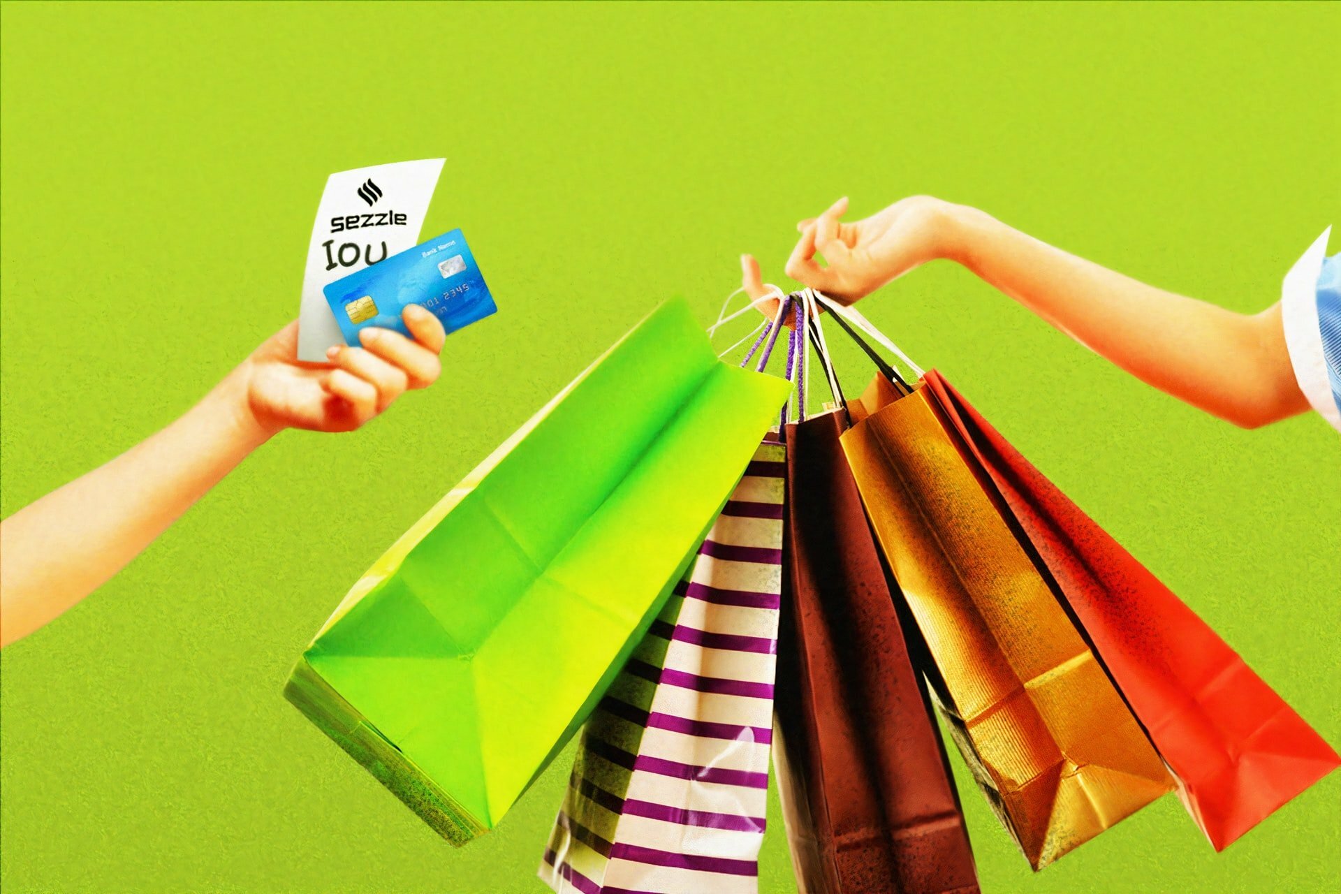a person holding a credit card and a package of candy