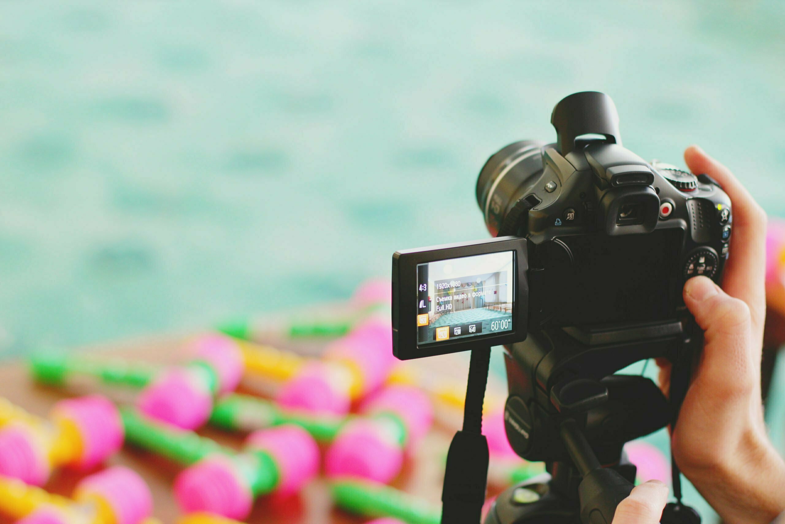 a person holding a camera